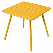 Table carrée 4 pieds LUXEMBOURG de Fermob, Miel